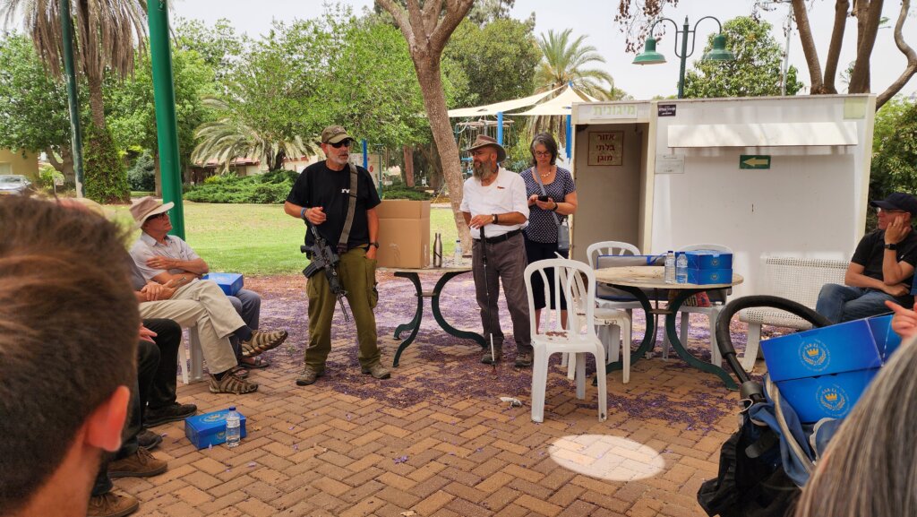 Briefing from local security chief at Kibbutz Re'im