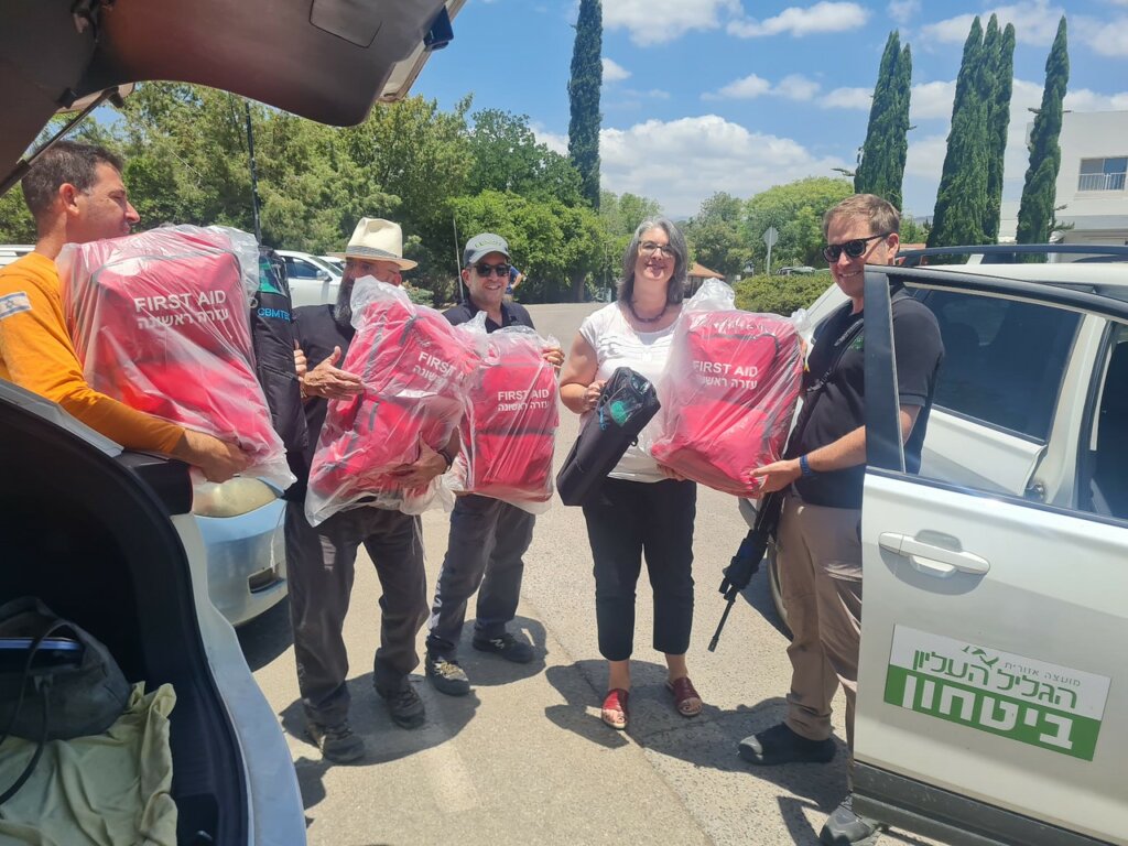 ICEJ staff delivering medical kits for first-responders. (Photo: Operation Lifeshield)