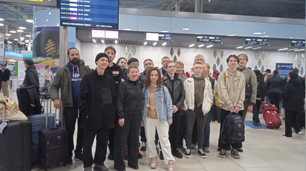 Sela students and their parents at the airport in Kazakhstan. (Photo: JAFI)