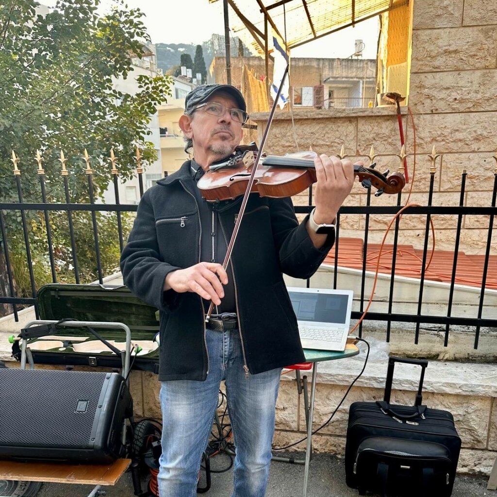 The talented violinist playing at the ceremony.